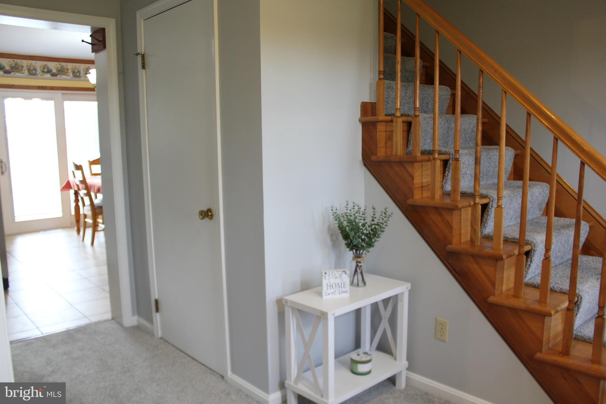 294 Starr Road Landenberg, PA 19350 - Photo 6 of 68 a view of staircase with lots of frames on wall and stairs