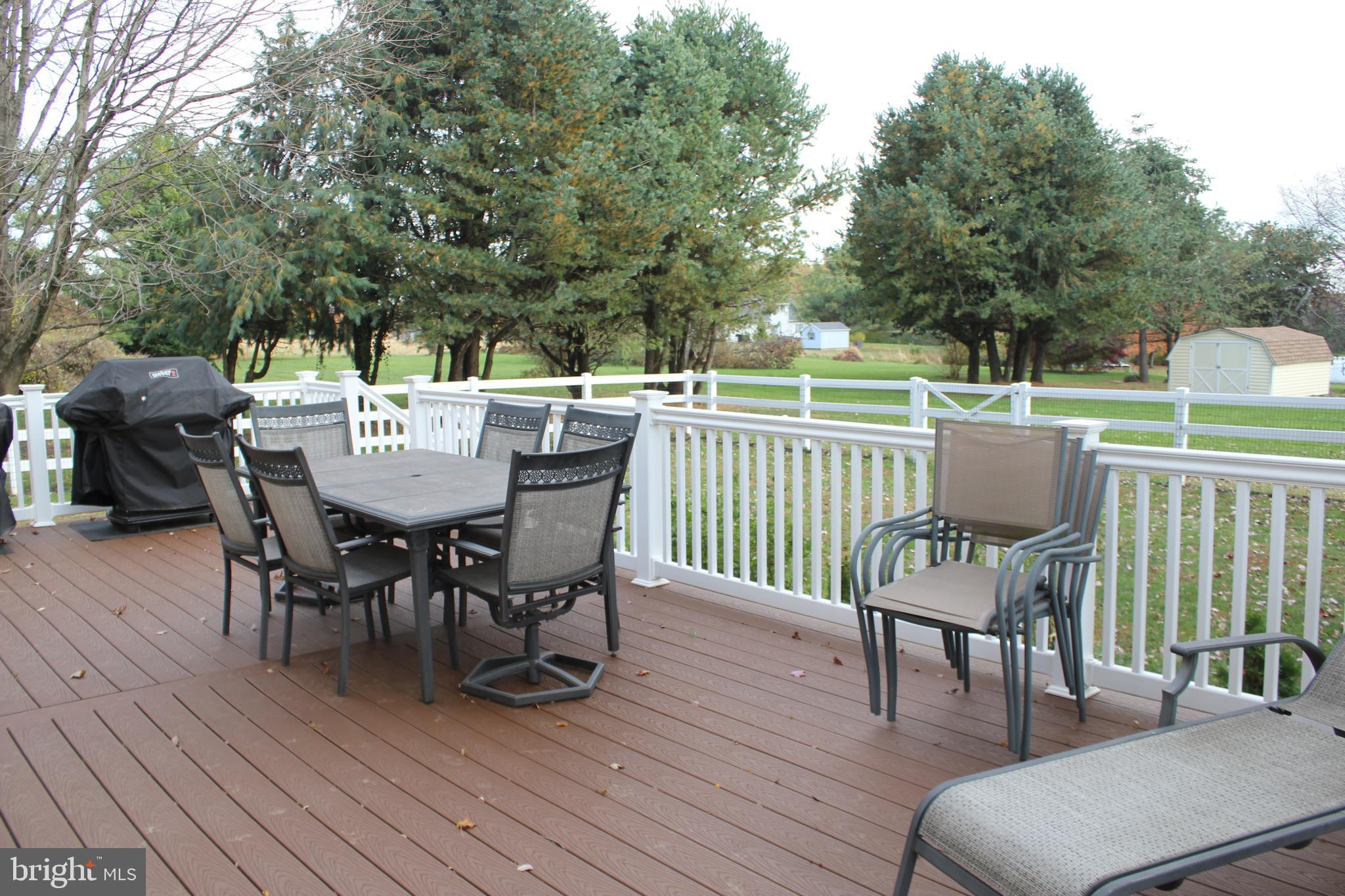 294 Starr Road Landenberg, PA 19350 - Photo 64 of 68 a view of a dining table and chairs in the roof deck