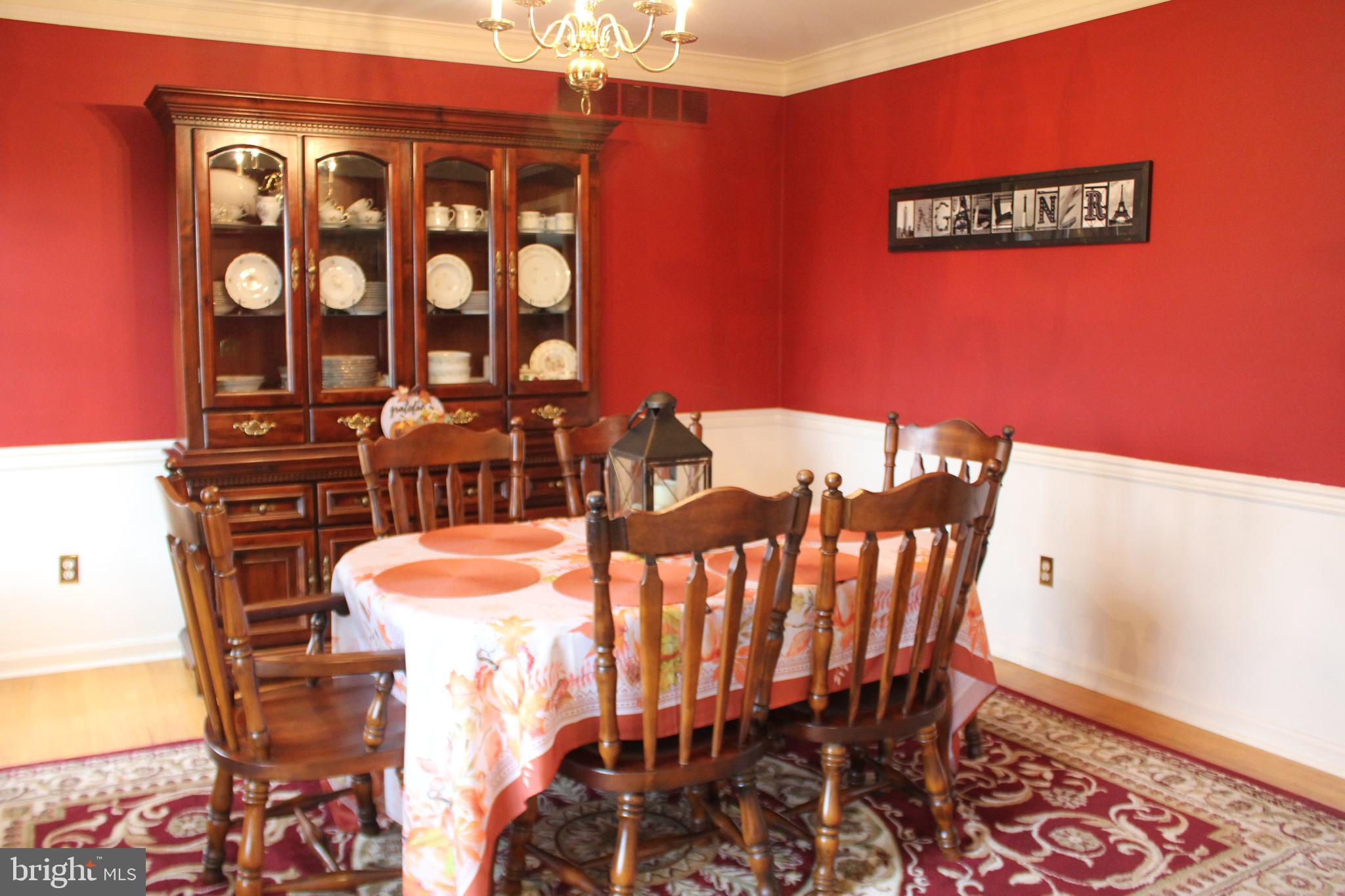294 Starr Road Landenberg, PA 19350 - Photo 7 of 68 a view of a dining room with furniture and chandelier