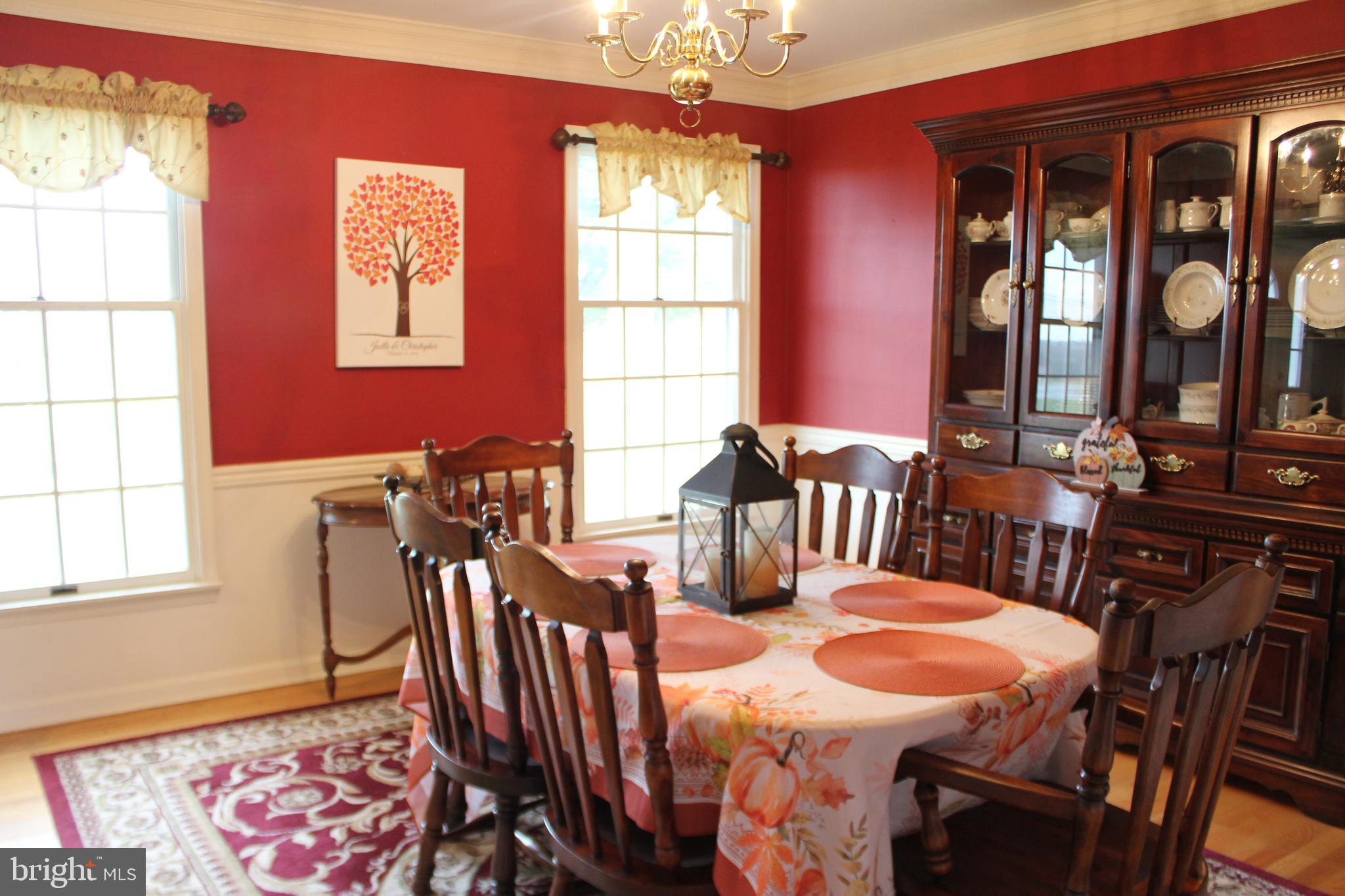 294 Starr Road Landenberg, PA 19350 - Photo 10 of 68 a view of a a dining room with furniture window and wooden floor