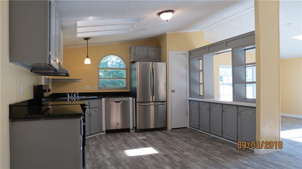 34 Winslow Road Naples, ME 04055 - Photo 6 of 29 Kitchen is open to the living area...