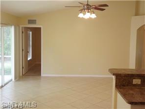 669 Homestead Road South, Unit 71 Lehigh Acres, FL 33974 - Photo 11 of 21 a view of empty room with window