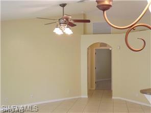 669 Homestead Road South, Unit 71 Lehigh Acres, FL 33974 - Photo 12 of 21 a view of dining room with chandelier