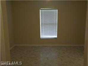 669 Homestead Road South, Unit 71 Lehigh Acres, FL 33974 - Photo 14 of 21 a view of a small space with a window
