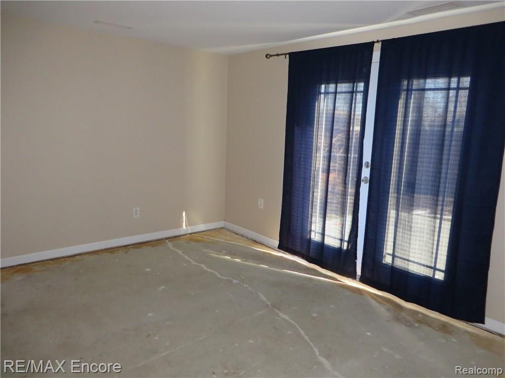 709 Cedarlawn Road Waterford, MI 48328 - Photo 7 of 17 Master Bedroom With French Doors Leading to Deck