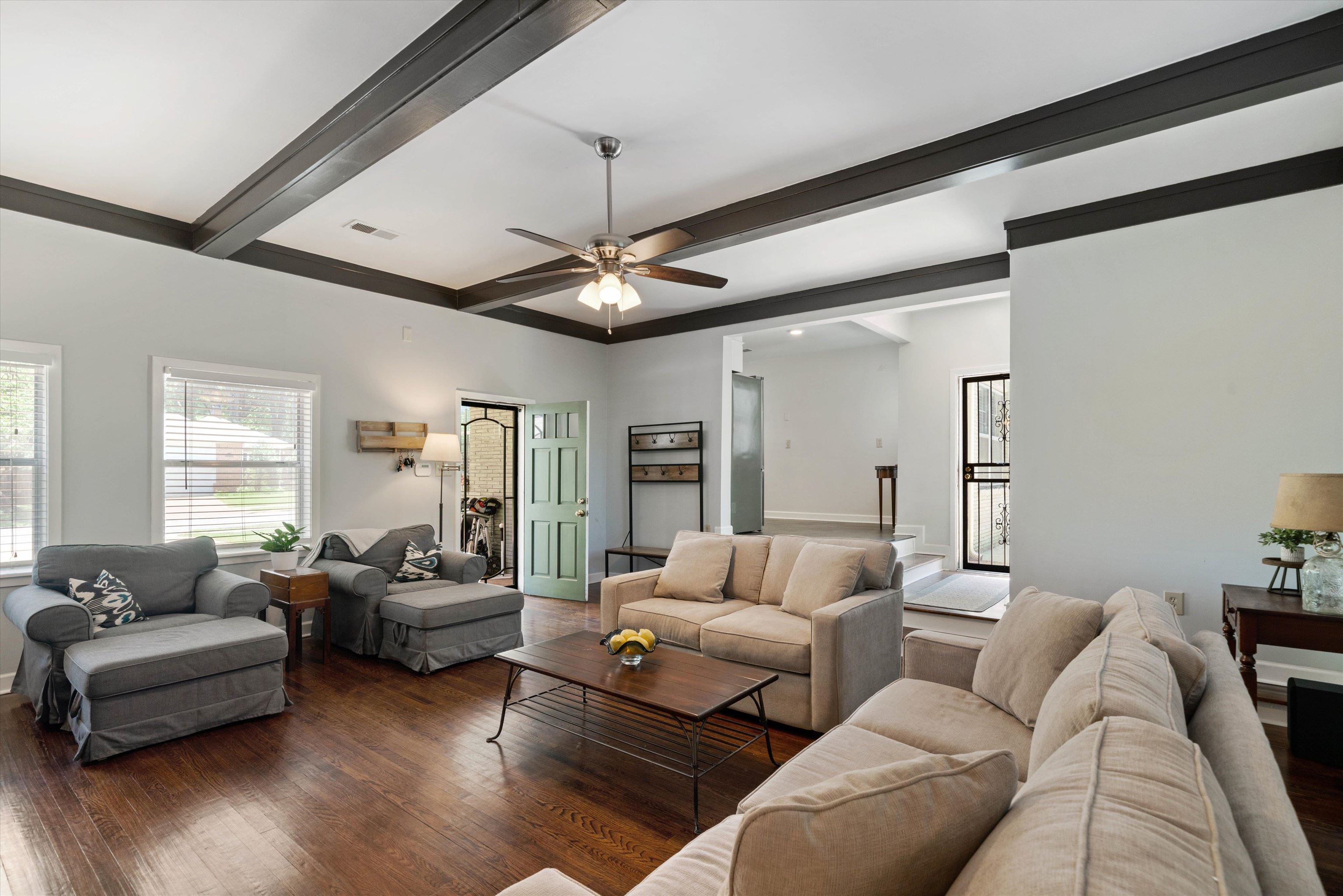 4208 Chickasaw Road Memphis, TN 38117 - Photo 11 of 25 a living room with furniture and a chandelier