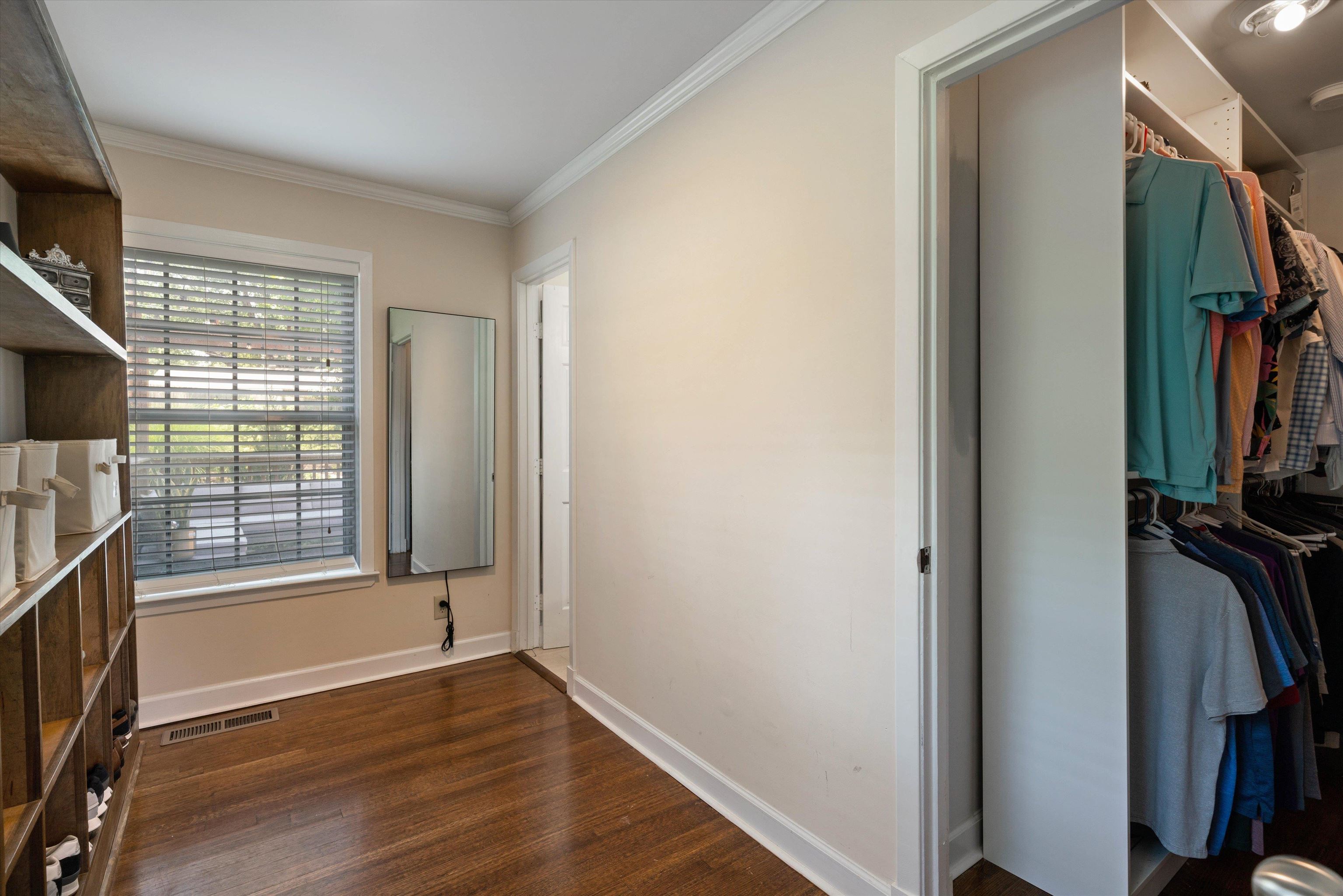 4208 Chickasaw Road Memphis, TN 38117 - Photo 15 of 25 a view of a room with wooden floor and a window