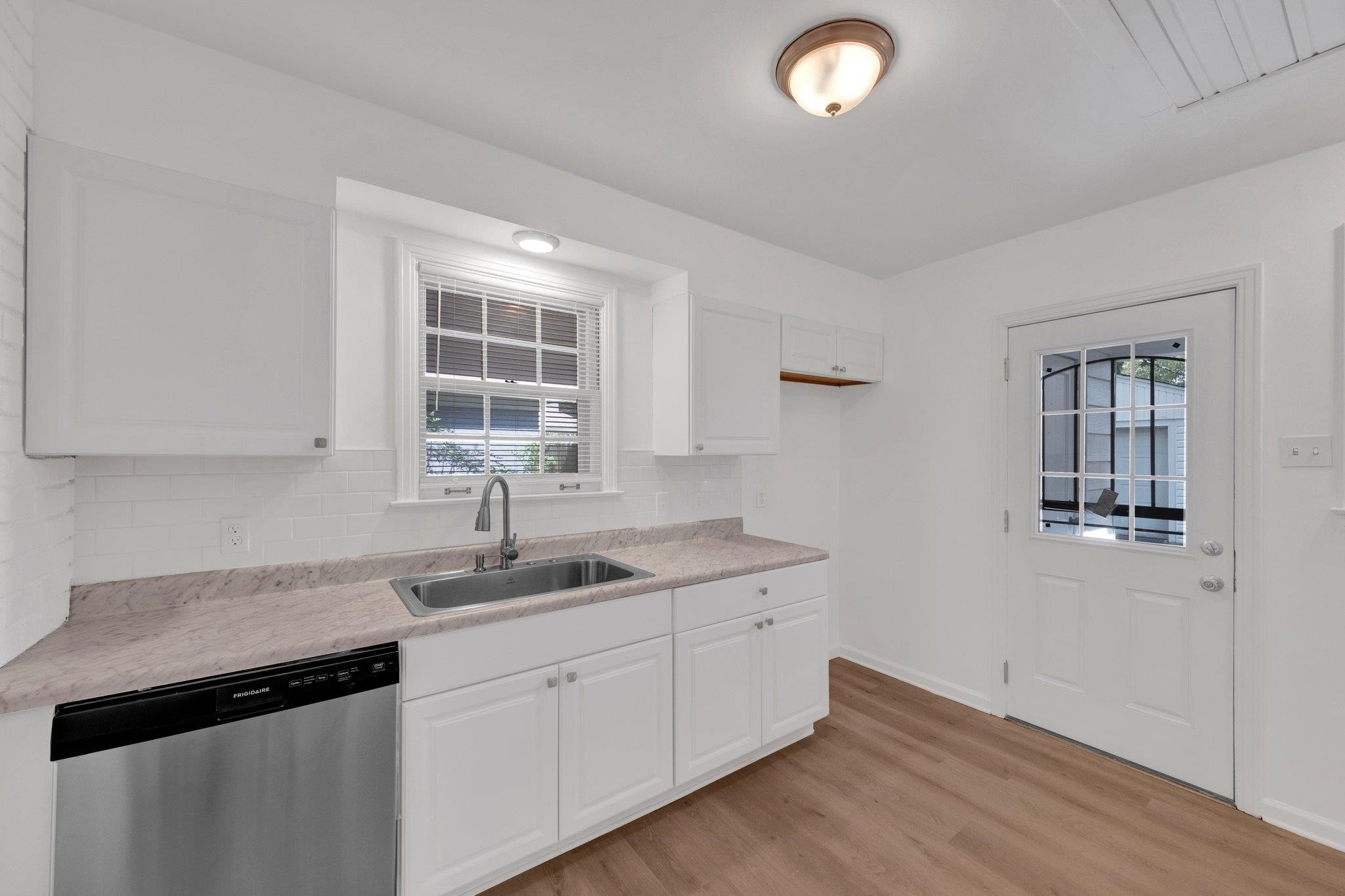 4936 Kaye Road Memphis, TN 38117 - Photo 13 of 32 a kitchen with sink and window