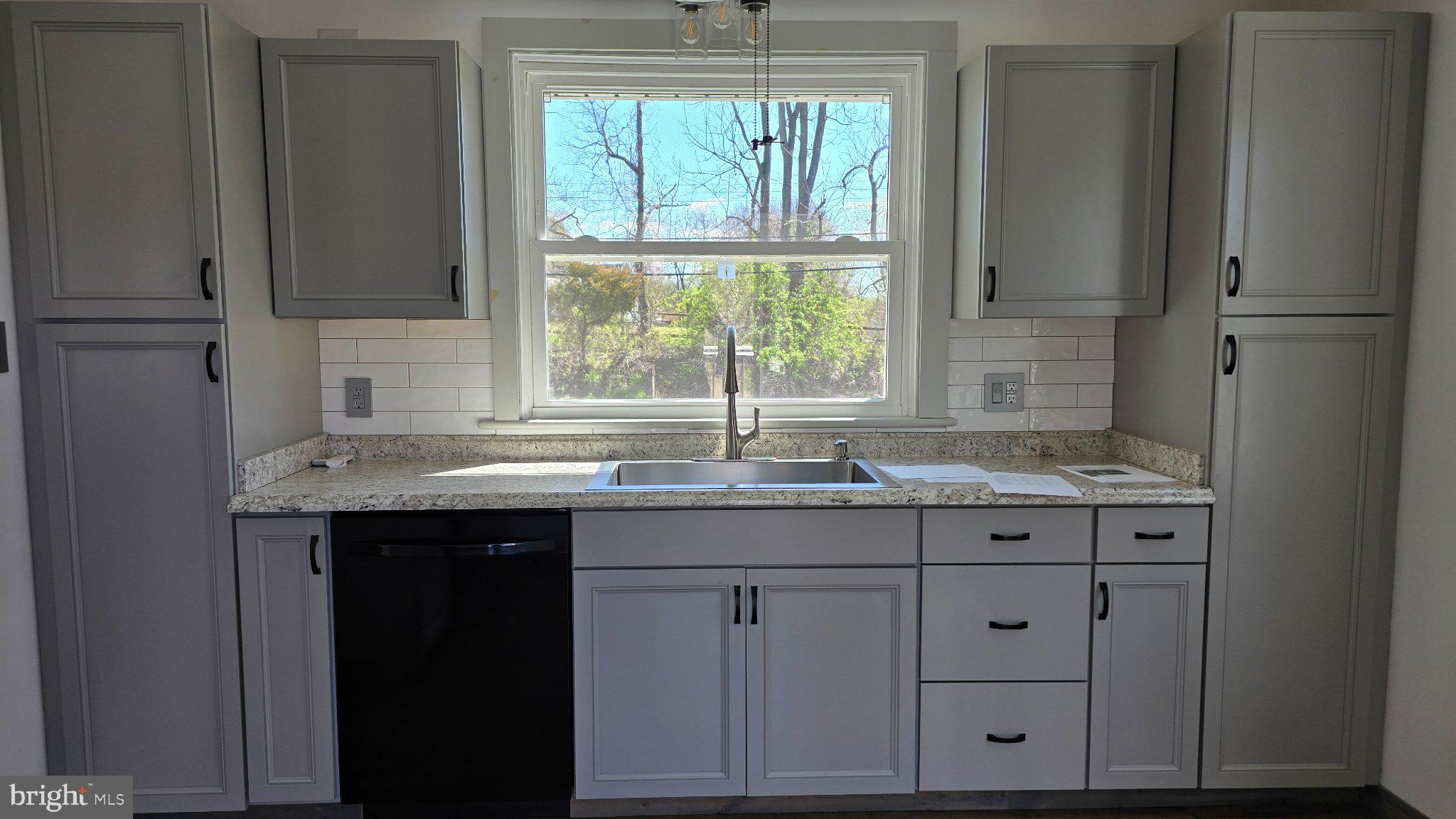 1233 New London Road Landenberg, PA 19350 - Photo 12 of 37 Modern kitchen with serene views.