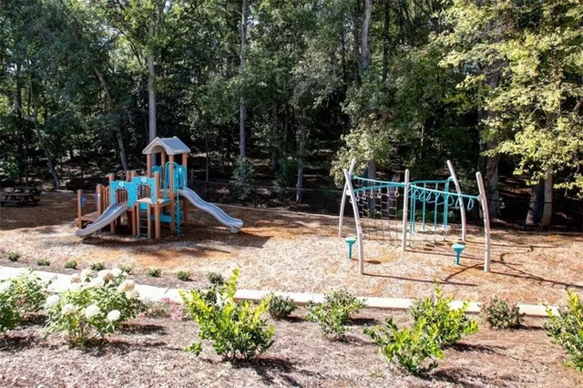 a view of a park with swings