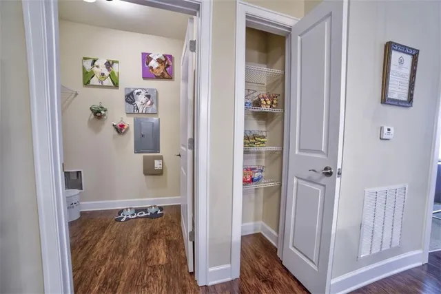 a view of a hallway with shelves