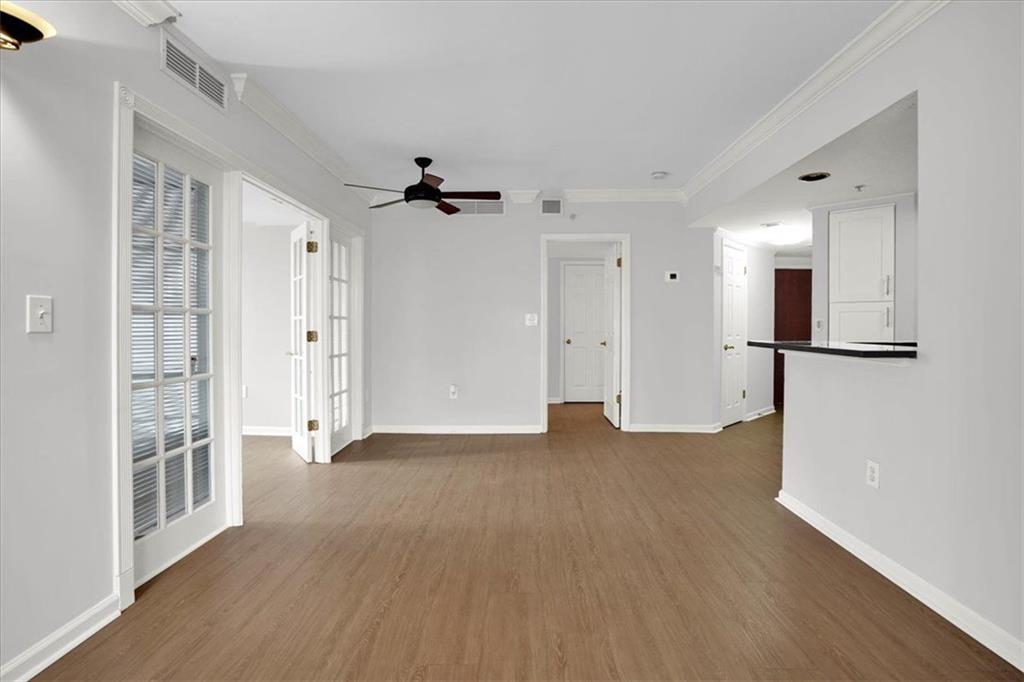 199 14th Street Northeast, Unit 2308 Atlanta, GA 30309 - Photo 12 of 35 a view of empty room with wooden floor