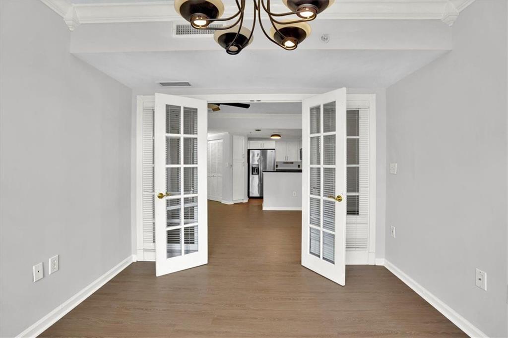 199 14th Street Northeast, Unit 2308 Atlanta, GA 30309 - Photo 15 of 35 a view of a livingroom with a ceiling fan