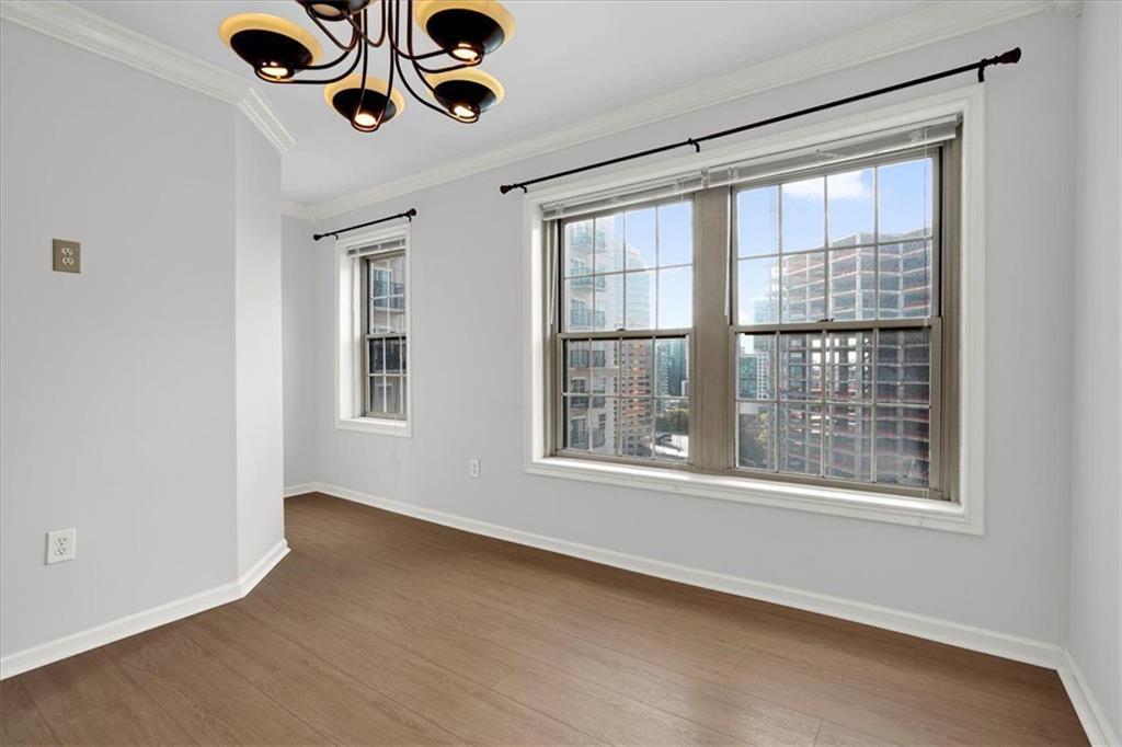 199 14th Street Northeast, Unit 2308 Atlanta, GA 30309 - Photo 16 of 35 an empty room with a window