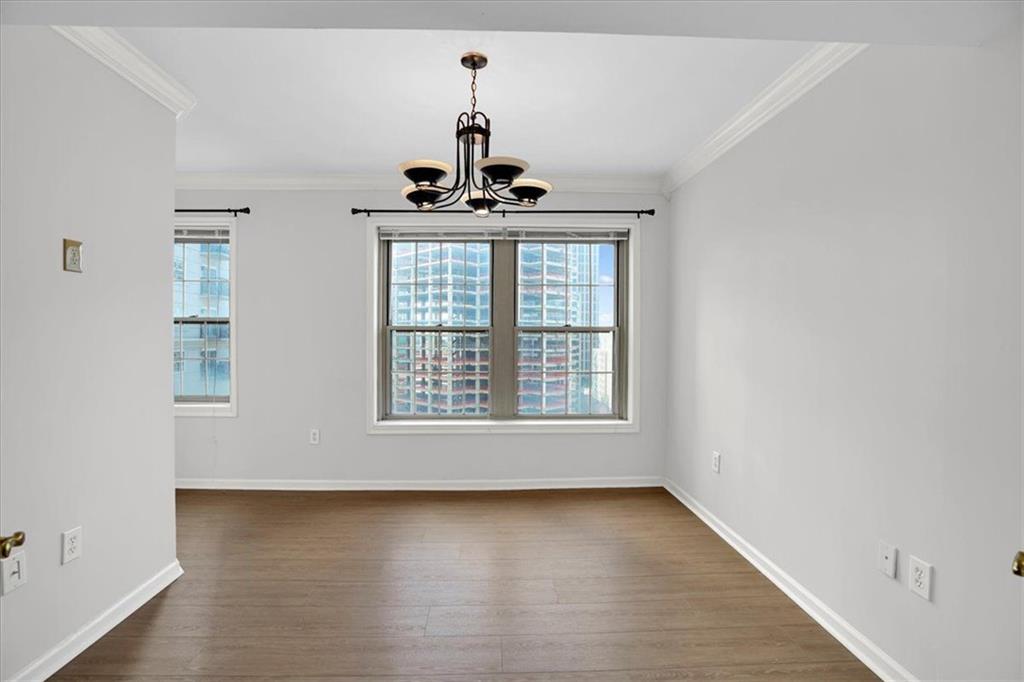 199 14th Street Northeast, Unit 2308 Atlanta, GA 30309 - Photo 17 of 35 a view of an empty room with a window