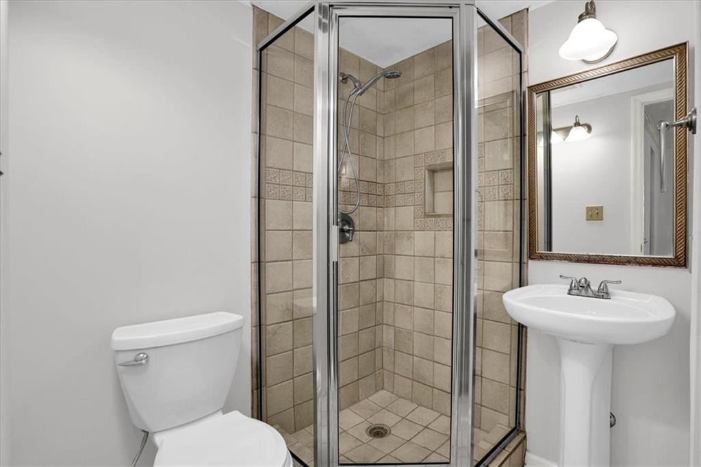 199 14th Street Northeast, Unit 2308 Atlanta, GA 30309 - Photo 24 of 35 a bathroom with a sink toilet and shower