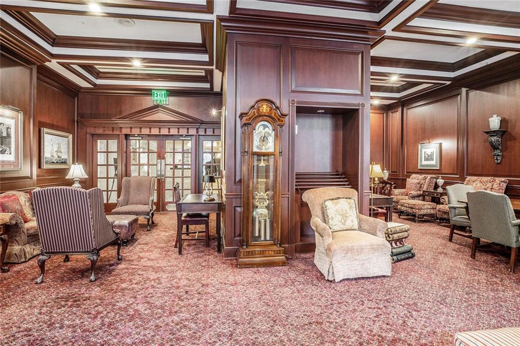 199 14th Street Northeast, Unit 2308 Atlanta, GA 30309 - Photo 28 of 35 a living room filled with furniture