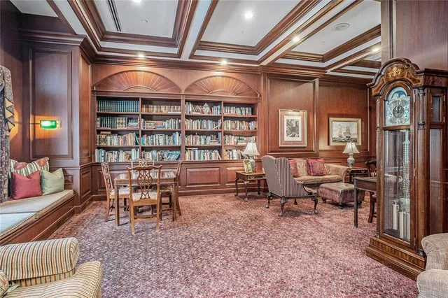 a view of a patio with table and chairs