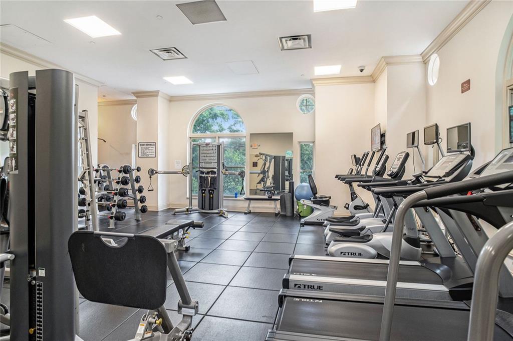 199 14th Street Northeast, Unit 2308 Atlanta, GA 30309 - Photo 31 of 35 a view of a room with gym equipment