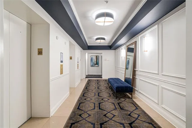 a view of a kitchen with a sink and a window