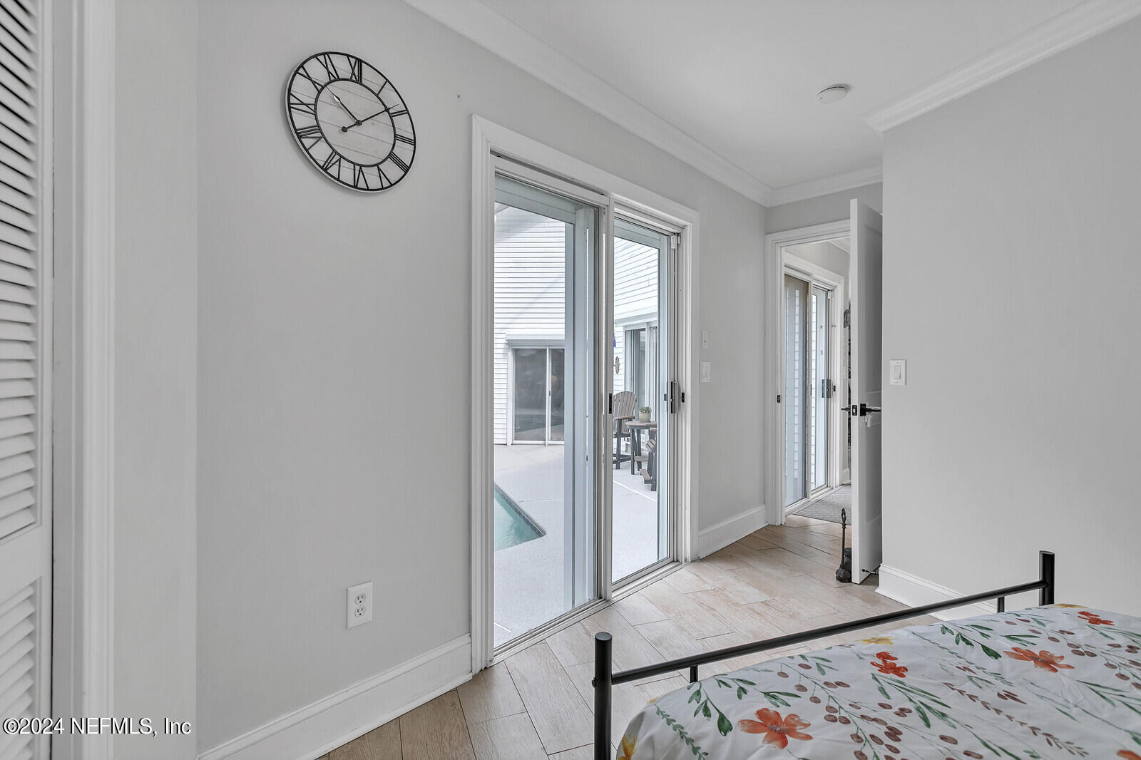 6695 Highway 16 St. Augustine, FL 32092 - Photo 19 of 46 a view of a hallway with a bedroom