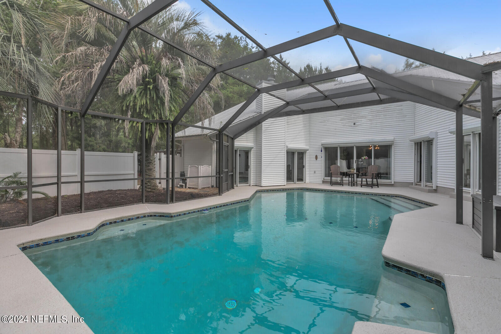 6695 Highway 16 St. Augustine, FL 32092 - Photo 3 of 46 a view of a swimming pool with a patio