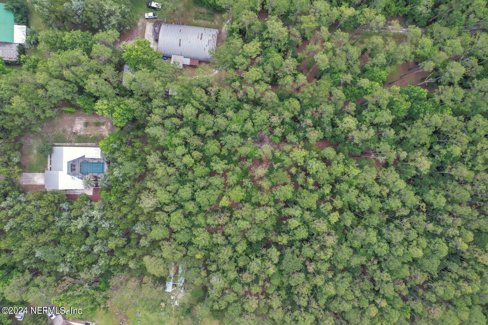 6695 Highway 16 St. Augustine, FL 32092 - Photo 35 of 46 an aerial view of a house with a yard and garden space