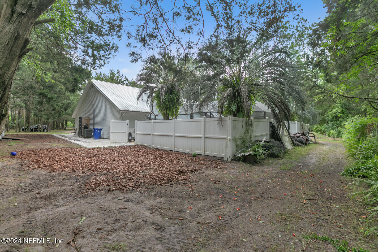 6695 Highway 16 St. Augustine, FL 32092 - Photo 45 of 46 a view of a house with a yard and tree