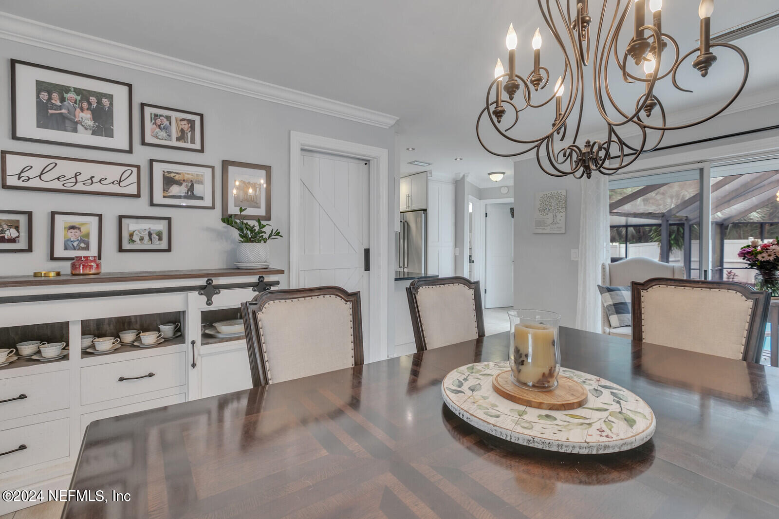 6695 Highway 16 St. Augustine, FL 32092 - Photo 7 of 46 a living room with furniture and a table