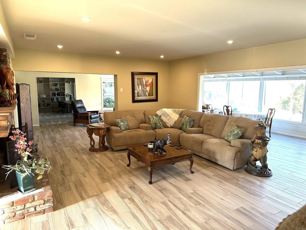 1001 Riverview Drive Fallbrook, CA 92028 - Photo 8 of 36 a living room with furniture and flowers