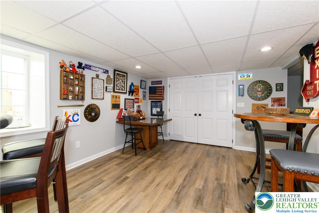 1286 Keller Road Wind Gap, PA 18091 - Photo 38 of 59 a view of a workspace with furniture and wooden floor
