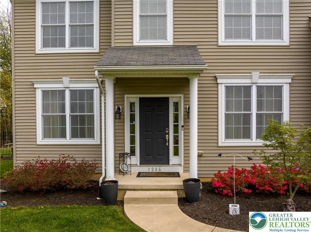 1286 Keller Road Wind Gap, PA 18091 - Photo 54 of 59 a front view of a house with a yard