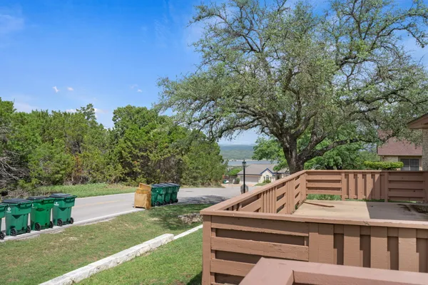 a balcony with wooden floor