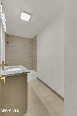 a utility room with a sink