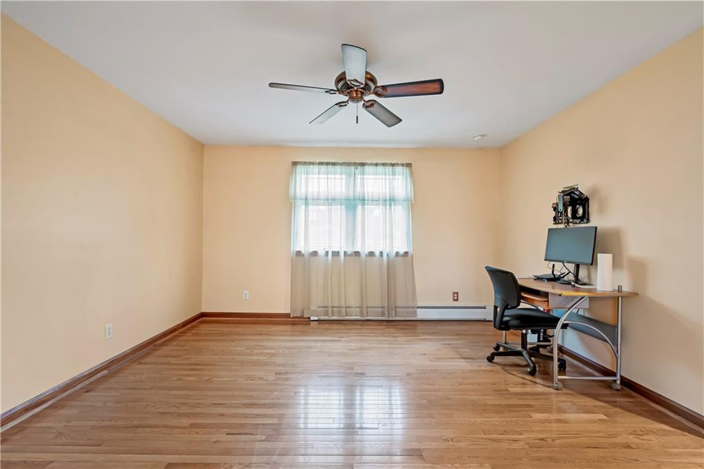 1820 Conway Wallrose Road Freedom, PA 15042 - Photo 15 of 25 a view of a workspace with wooden floor and a window