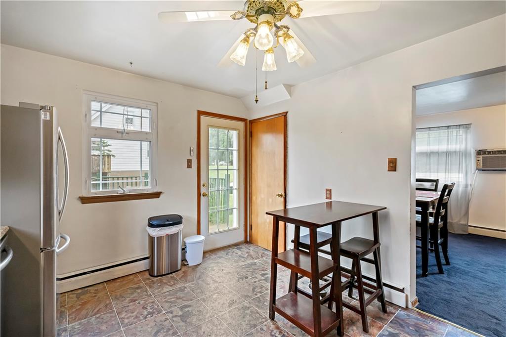 1820 Conway Wallrose Road Freedom, PA 15042 - Photo 8 of 25 a view of a dining room with furniture window and wooden floor