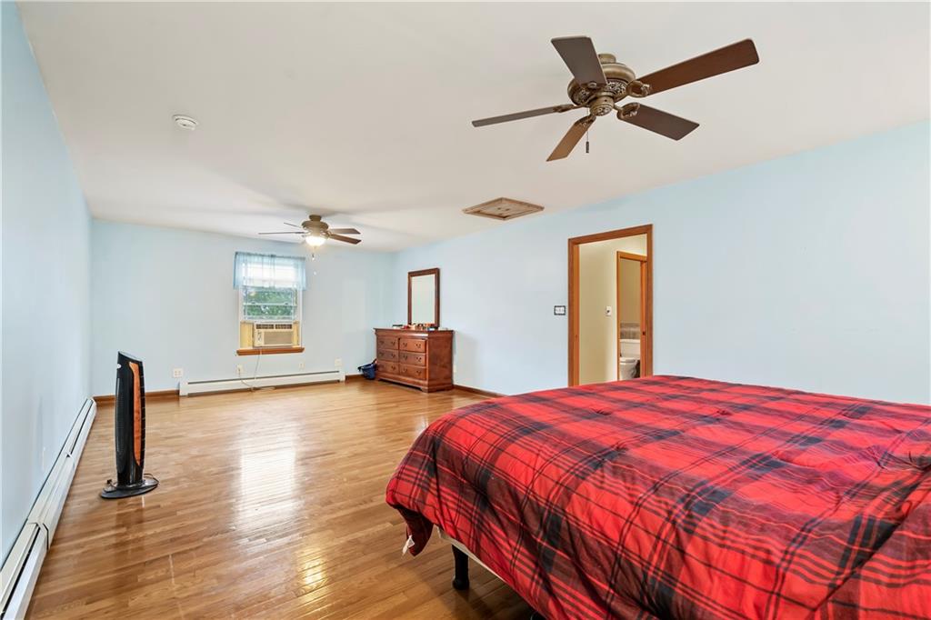 1820 Conway Wallrose Road Freedom, PA 15042 - Photo 10 of 25 a bedroom with a bed and a dresser