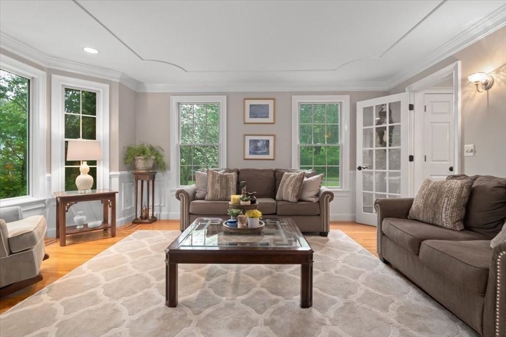 22 Dover Drive Walpole, MA 02081 - Photo 17 of 41 a living room with furniture and a large window