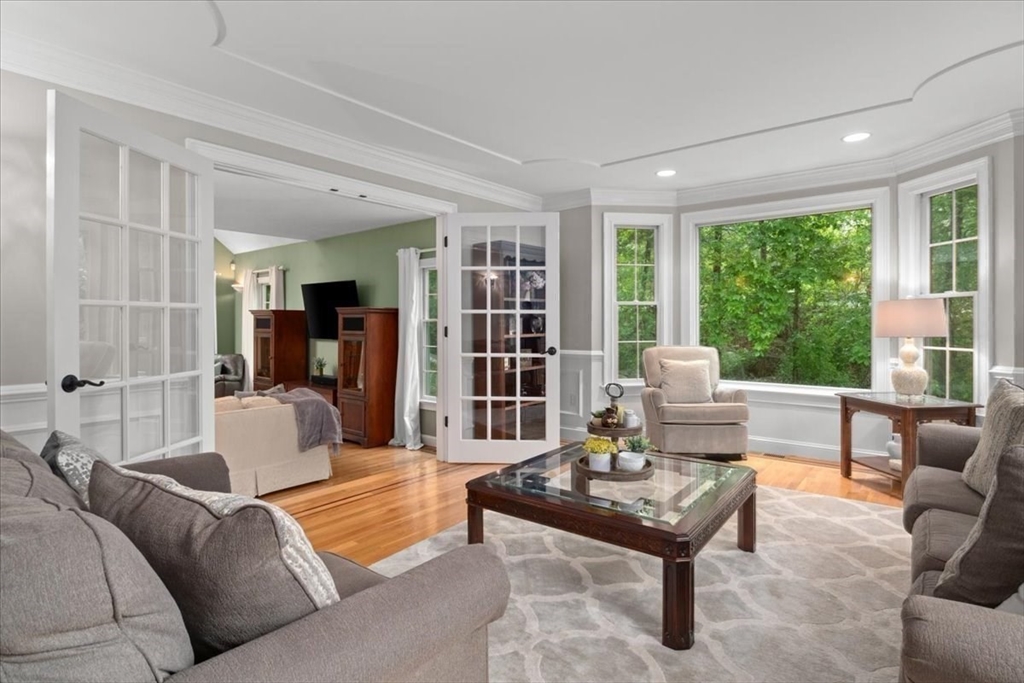 22 Dover Drive Walpole, MA 02081 - Photo 18 of 41 a living room with furniture and a large window