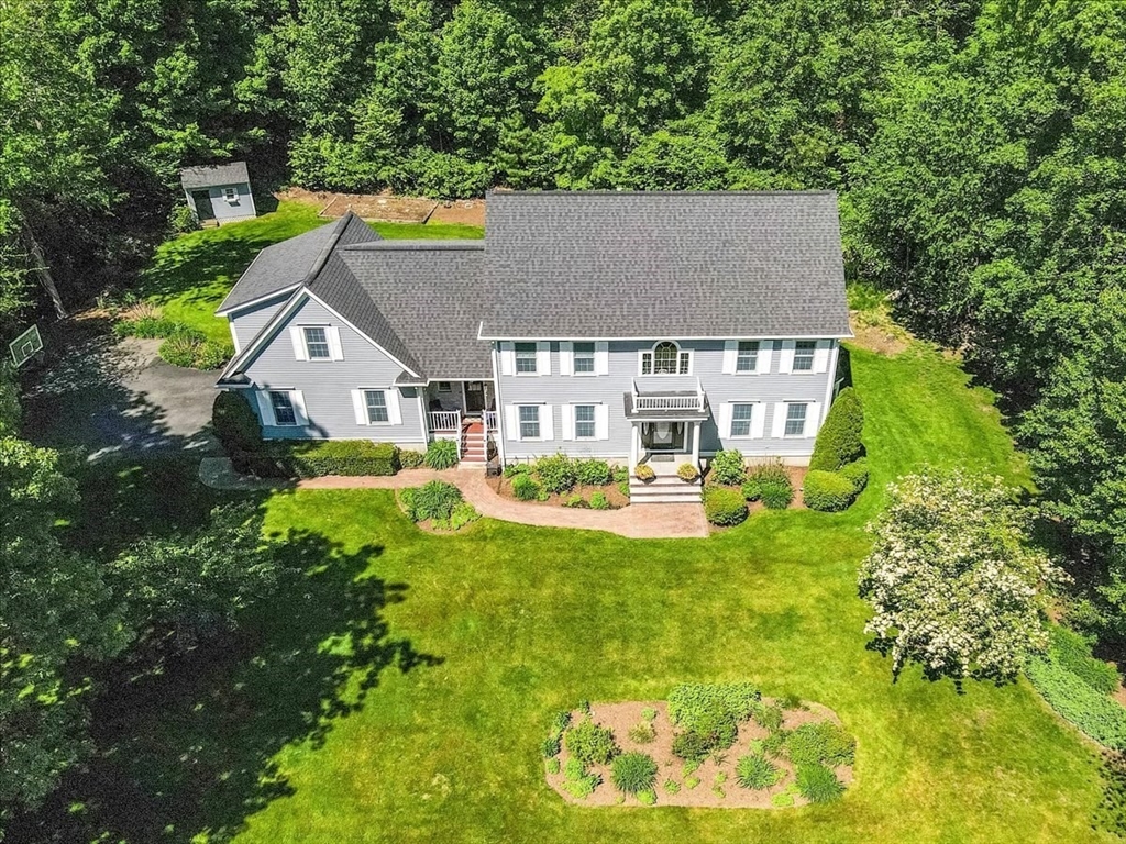 22 Dover Drive Walpole, MA 02081 - Photo 2 of 41 a view of house with outdoor space and swimming pool