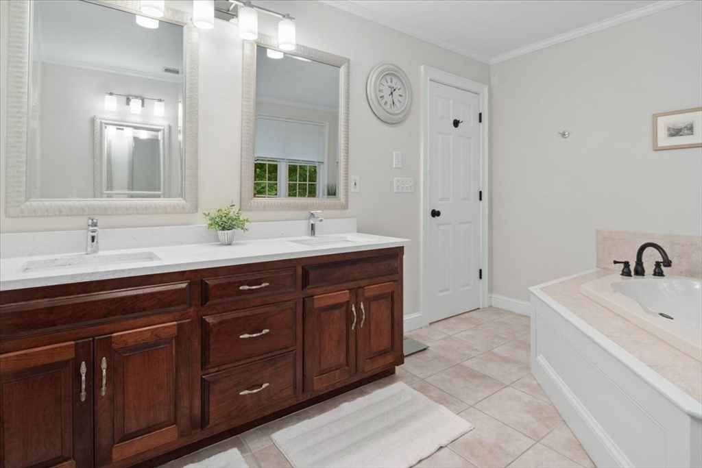 22 Dover Drive Walpole, MA 02081 - Photo 25 of 41 a spacious bathroom with double sink and a mirror