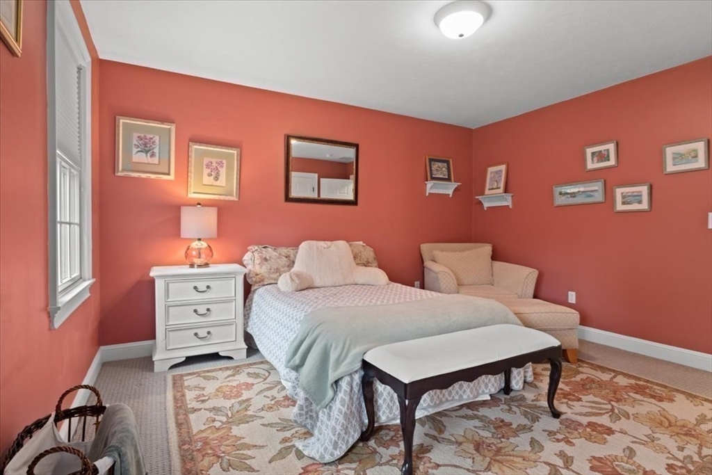 22 Dover Drive Walpole, MA 02081 - Photo 29 of 41 a bedroom with furniture and wooden floor