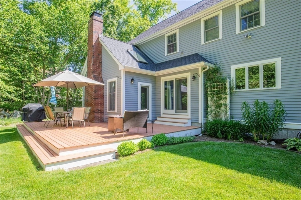 22 Dover Drive Walpole, MA 02081 - Photo 38 of 41 a view of a house with backyard and sitting area