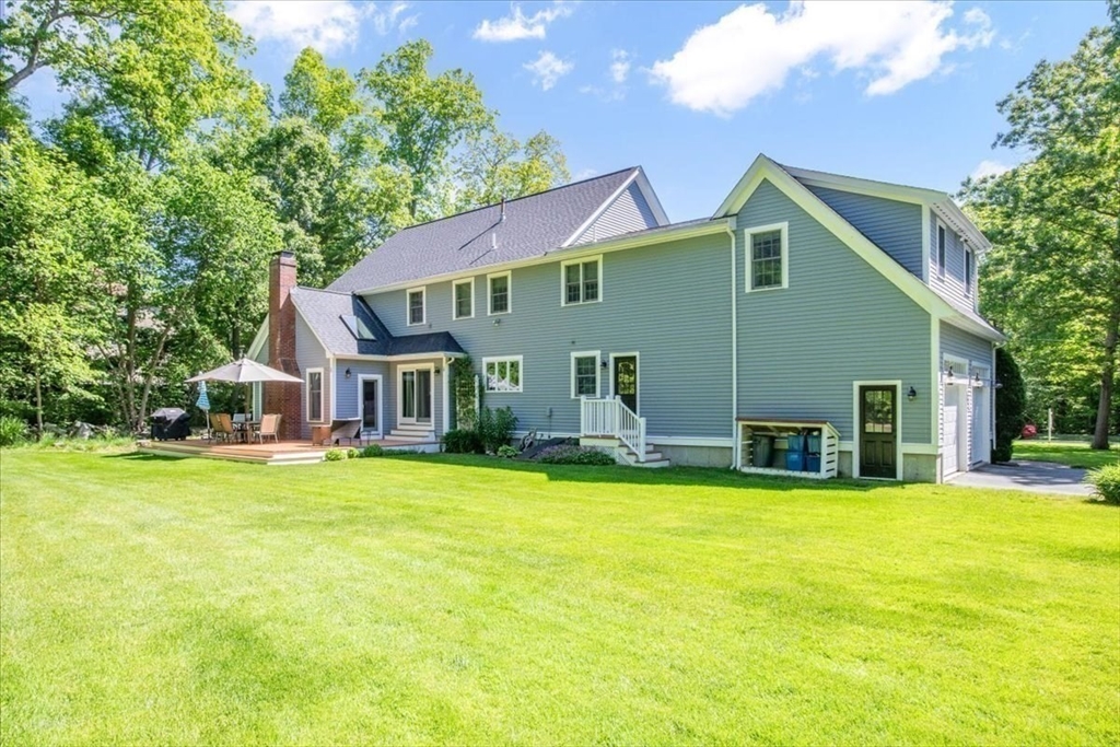 22 Dover Drive Walpole, MA 02081 - Photo 39 of 41 a view of a house with a swimming pool