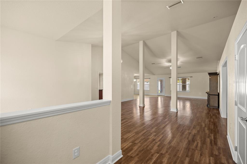 4441 Southwest 62nd Loop Ocala, FL 34474 - Photo 14 of 42 a view of interior space with wooden floor and windows
