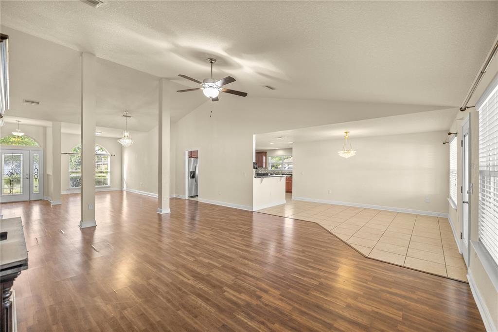 4441 Southwest 62nd Loop Ocala, FL 34474 - Photo 19 of 42 a view of a hallway with wooden floor