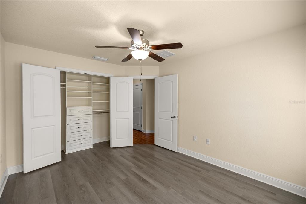 4441 Southwest 62nd Loop Ocala, FL 34474 - Photo 42 of 42 wooden floor in an empty room