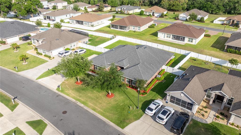 4441 Southwest 62nd Loop Ocala, FL 34474 - Photo 6 of 42 an aerial view of a house with a swimming pool