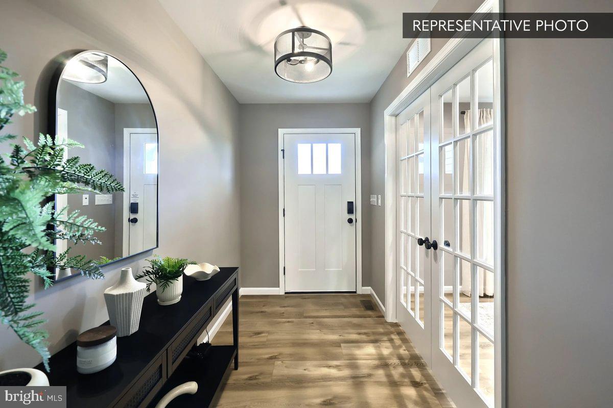 126 Redbud Road Bellefonte, PA 16823 - Photo 12 of 16 a view of a livingroom with furniture and entryway