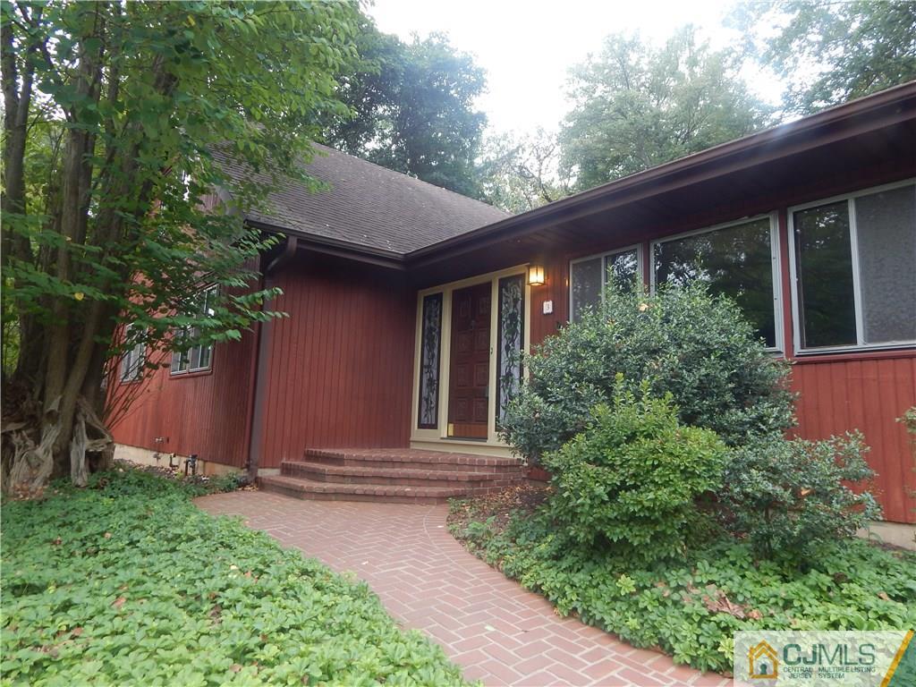 3 Whitewood Road Edison, NJ 08820 - Photo 3 of 28 front view of a house with a yard